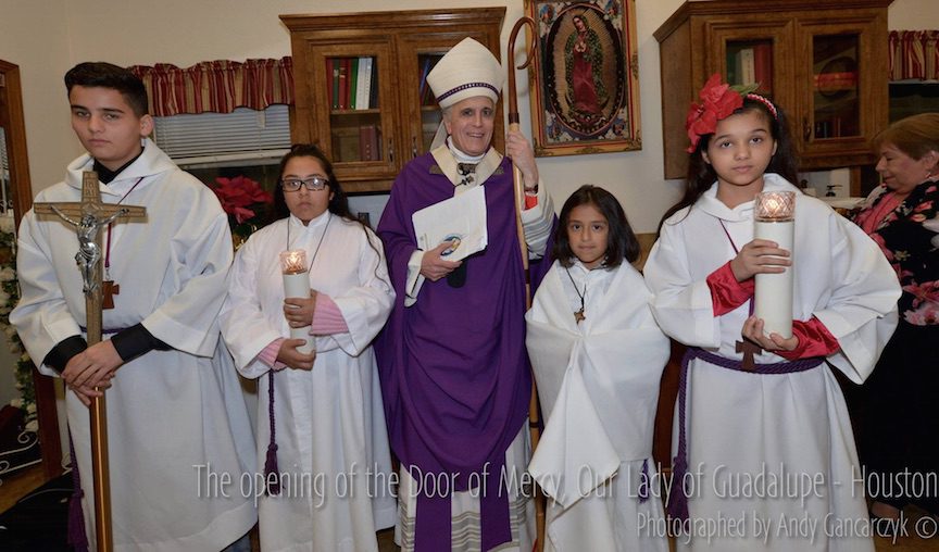 Daniel Cardinal DiNardo with acolytes before the Year of Mercy liturgy at OLG.