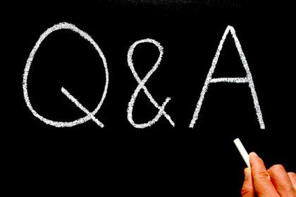 Writing Q&A, Questions and Answers on a blackboard.