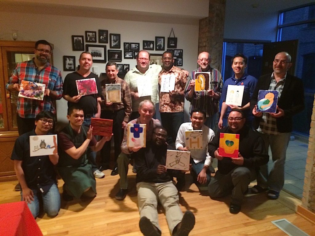 Members of the Dehon Formation Community with their completed pieces of art.