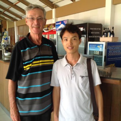 Fr. Tom with a student in the Philippines