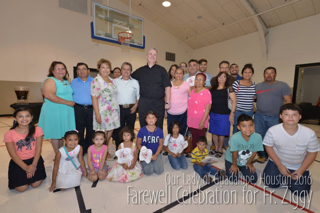 Fr. Ziggy with OLG parishioners