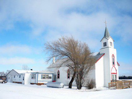 A snowy St. Catherine Church in Big Bend, SD. It is one of several parishes ministered to by the Lower Brule Pastoral Team.