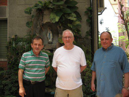 Fr. Bernie Rosinski (middle) with fellow travelers