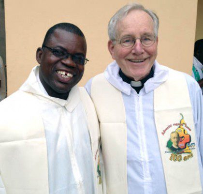 Fr. Jan (right) with Fr. Kiko, an alumnus of SHST's ESL program 