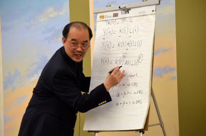 Fr. Quang explains economic formulas 