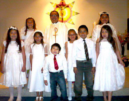 Fr. Vincent with the 2014 First Communion class in Lower Brule, SD