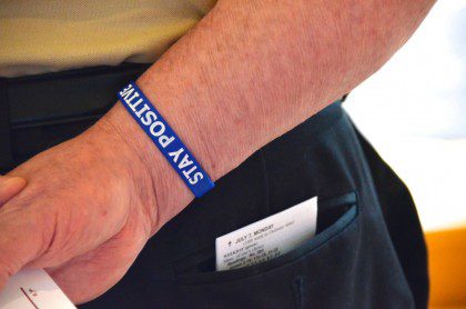 Fr. Bernie's bracelet sums up the mood of the chapter: "Stay Positive."