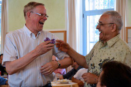 Fr. John receives a gift from Fr. Ornelas. June 5 was Fr. John's 50th anniversary