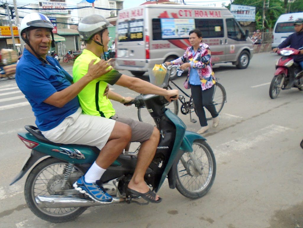 Fr. Paul hitches a ride in Vietnam.
