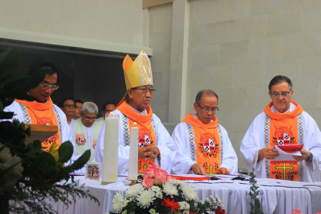 Fr. Mark (far right) during the blessing of the new Motherhouse in Indonesia