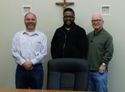 Thadeus Brooks with Fr. David Szatkowski and Fr. John Czyzynski