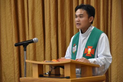 Fr. Paul preaching at a conference